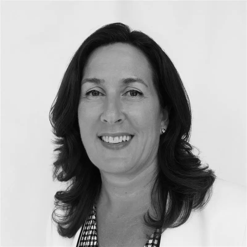 Black and white image of a woman smiling