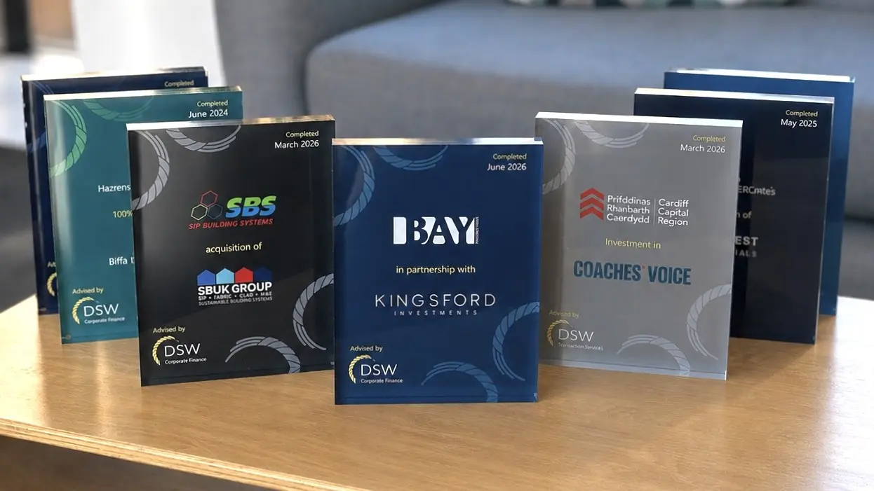 An image of DSW plaques headlining the recent deals they supported on